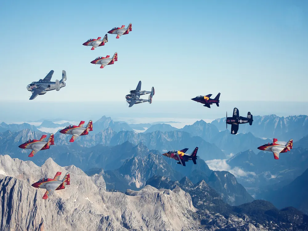 <p><strong>Eagle Formation Soars Over Austrian Peaks</strong></p>