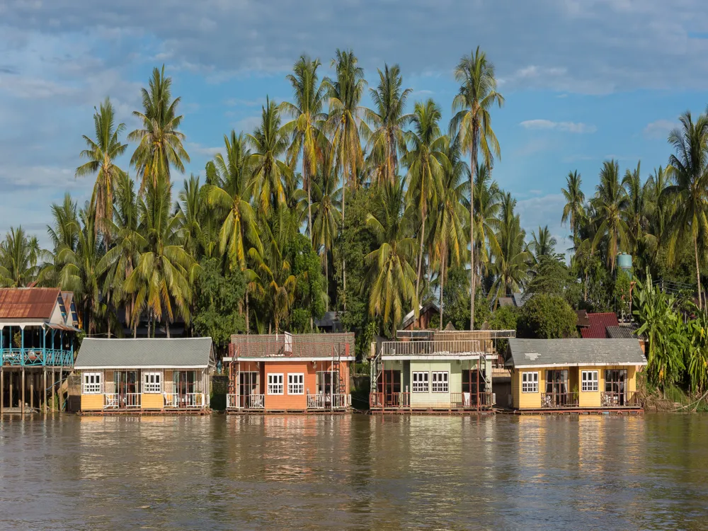 <p><strong>Vibrant Floating Bungalows Along Mekong River</strong></p>